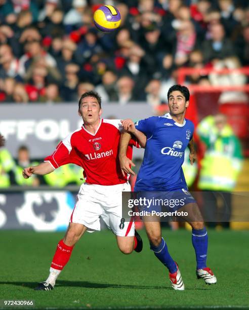 Matt Holland of Charlton Athletic and Mikel Arteta of Everton in action during the Barclays Premiership match between Charlton Athletic and Everton...