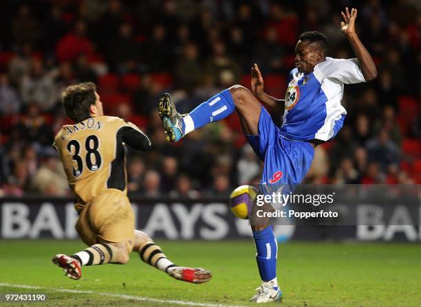 Charlton Athletic goalkeeper Scott Carson saves from Shabani Nonda of Blackburn Rovers during the Barclays Premiership match between Charlton...