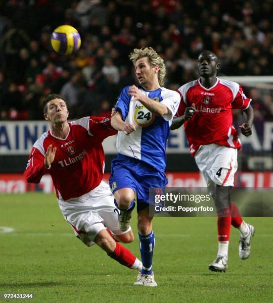 Robbie Savage of Blackburn Rovers and Bryan Hughes of Charlton Athletic battle for the ball during the Barclays Premiership match between Charlton...