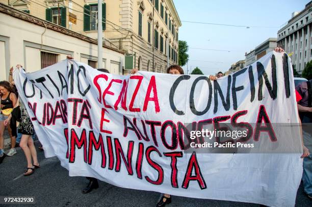 Protesters holding a banner during a demonstration under the Minister of Transport in Rome for the opening of Italian ports in the Emergency for the...