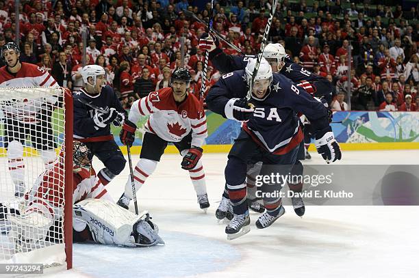 Winter Olympics: USA Zach Parise victorious, celebration with Jamie Langenbrunner after scoring game tying goal with 24.4 seconds left in 3rd period...