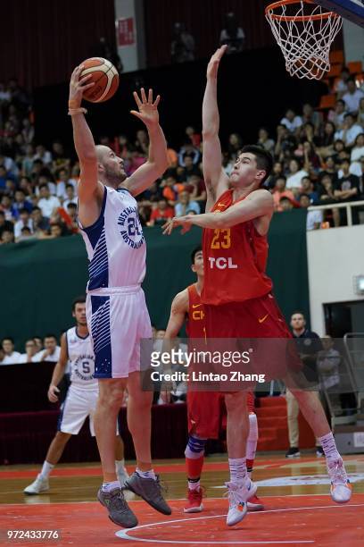 Jesse Wagstaff of Australia drives to the basket against Abudou of China during the 2018 Sino-Australia Men's Internationl Basketball Challenge match...