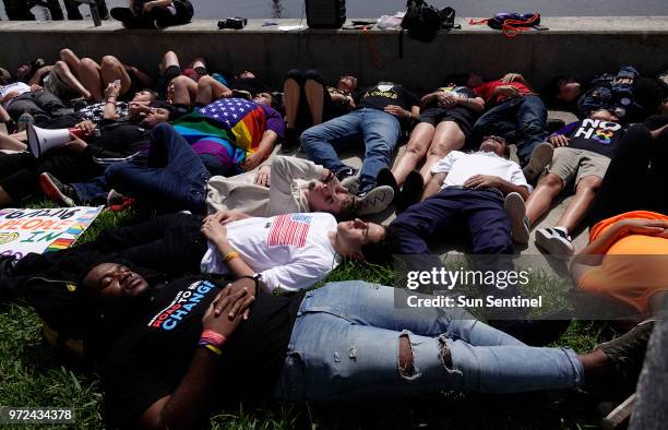 Students from Marjory Stoneman Douglas High School participate in a die-in to mark the anniversary of the Pulse nightclub shooting, Tuesday, June 12...