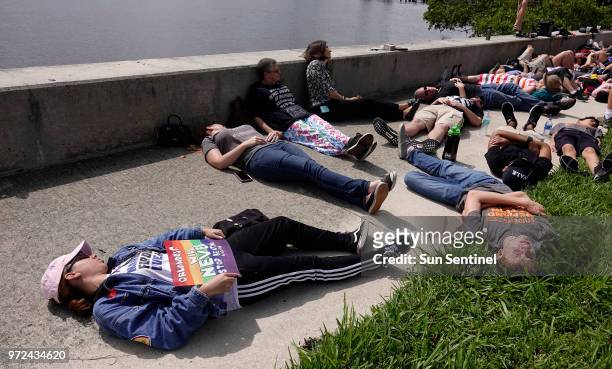 Citizens of West Palm Beach participates in a die-in to mark the anniversary of the Pulse nightclub shooting, Tuesday, June 12 in West Palm Beach...
