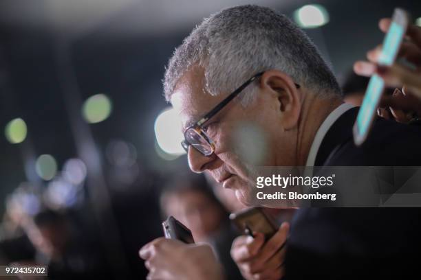 Ivan Monteiro, chief executive officer of Petroleos Brasileiros SA , speaks to members of the media at the National Congress building following a...