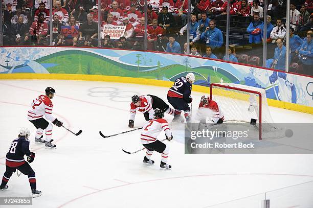 Winter Olympics: Canada goalie Roberto Luongo in action, save vs USA Dustin Brown during Men's Gold Medal Game - Game 30 at Canada Hockey Place....