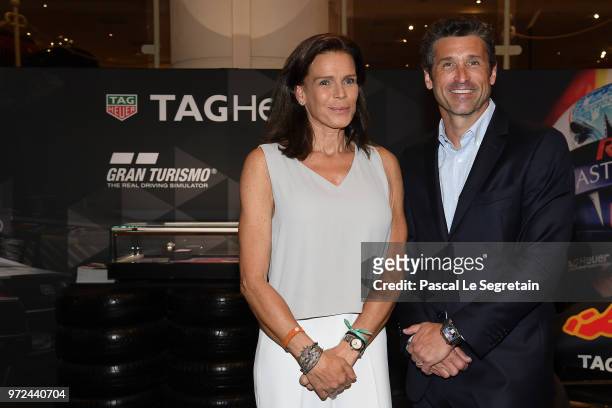 Princess Stephanie of Monaco poses with TAG Heuer Ambassador and actor Patrick Dempsey, during a visit to the Car Collection of the Prince in Monaco...