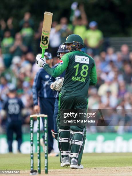 Shoaib Malik of Pakistan reaches 50 during the International T20 Friendly match between Scotland and Pakistan at the Grange Cricket Club on June 12,...
