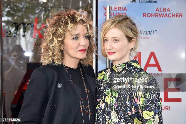 Valeria Golino and Alba Rohrwacher attend the "Ma Fille - Mia Figlia" Paris Premiere at Mk2 Bibliotheque on June 12, 2018 in Paris, France.