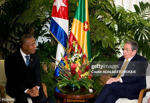 Cuban President Raul Castro holds a meeting with Grenada's Prime Minister Tillman Thomas at Revolution Palace in Havana on March 1, 2010. Thomas is...