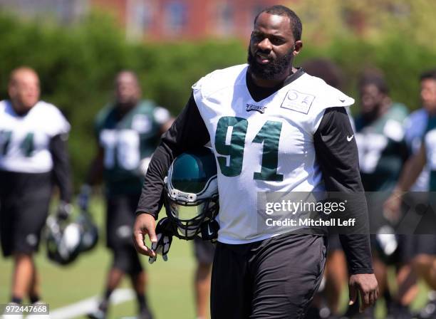 Fletcher Cox of the Philadelphia Eagles walks off the field after Eagles minicamp at the NovaCare Complex on June 12, 2018 in Philadelphia,...