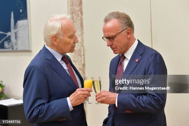 Edmund Stoiber and Karl-Heinz Rummenigge during Karl Hopfner Is Awarded With The Federal Cross of Merit at department of the Interior on June 12,...
