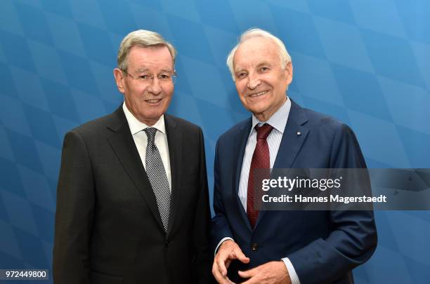 Karl Hopfner, CFO of FC Bayern Muenchen and Dr. Edmund Stoiber during Karl Hopfner Is Awarded With The Federal Cross of Merit at department of the...