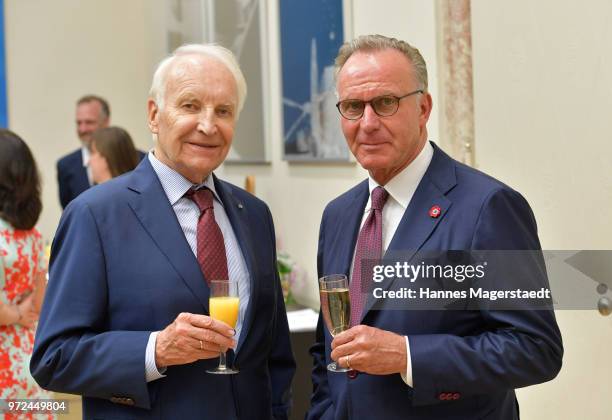 Edmund Stoiber and Karl-Heinz Rummenigge during Karl Hopfner Is Awarded With The Federal Cross of Merit at department of the Interior on June 12,...