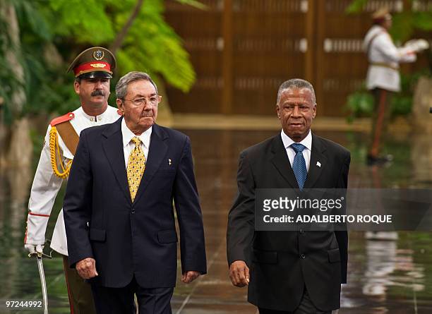 Cuban President Raul Castro welcomes Grenada's Prime Minister Tillman Thomas at Revolution Palace in Havana on March 1, 2010. Thomas is in Cuba in a...