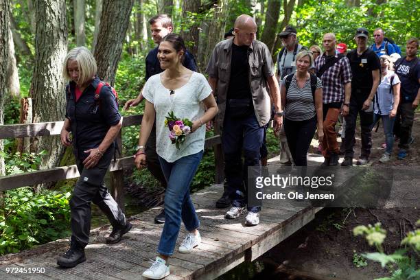 Crown Princess Victoria of Sweden during a hiking tour at Stenshuvud National Park on June 12, 2018 in Stenshuvud, Sweden. Last summer the Crown...