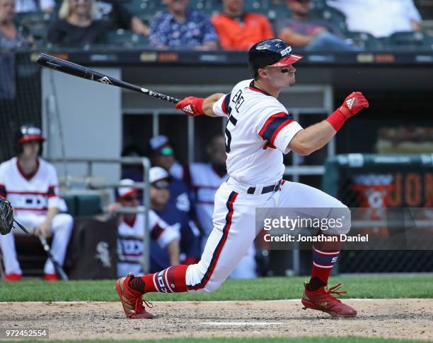 Adam Engel of the Chicago White Sox hits a run scoring double in the 8th inning aginst the Milwaukee Brewers at Guaranteed Rate Field on June 3, 2018...