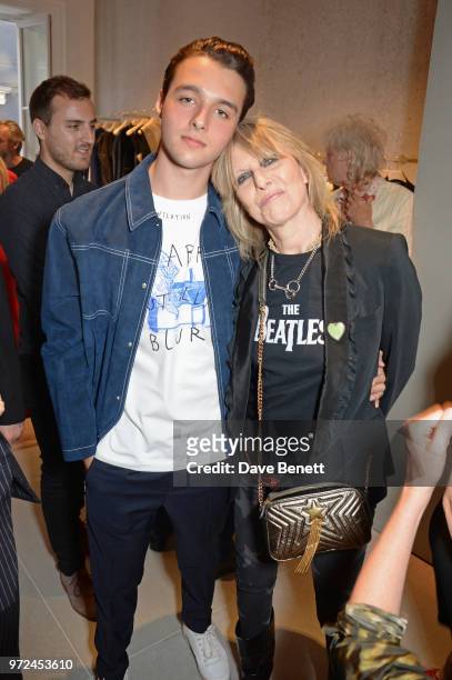 Arthur Donald and Chrissie Hynde attend the launch of the Stella McCartney Global flagship store on Old Bond Street on June 12, 2018 in London,...