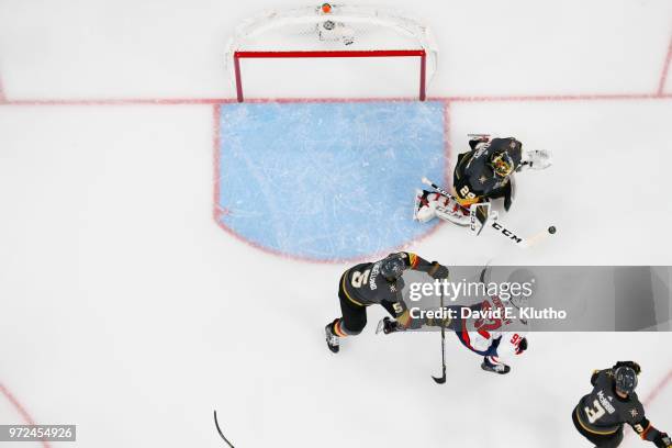 Aerial view of Vegas Golden Knights goalie Marc-Andre Fleury in action vs Washington Capitals Evgeny Kuznetsov at T-Mobile Arena. Game 5. Las Vegas,...