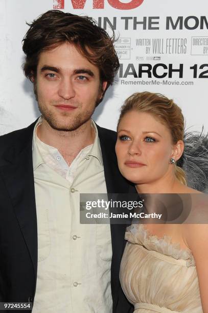 Actor Robert Pattinson and actress Emilie de Ravin attend the premiere of "Remember Me" at the Paris Theatre on March 1, 2010 in New York City.