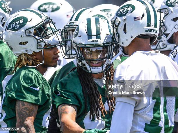 Defensive back Buster Skrine and defensive back Parry Nickerson of the New York Jets break huddle during mandatory mini camp on June 12, 2018 at The...