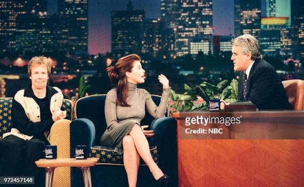 Episode 1492 -- Pictured: Comedian Dana Carvey and Actress Yasmine Bleeth during an interview with host Jay Leno on November 19, 1998 --