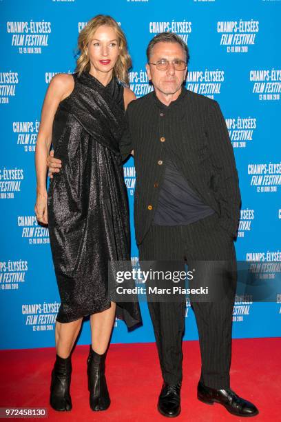 Nikki Butler and actor Tim Roth attend the 7th Champs Elysees Film Festival at Cinema Gaumont Marignan on June 12, 2018 in Paris, France.