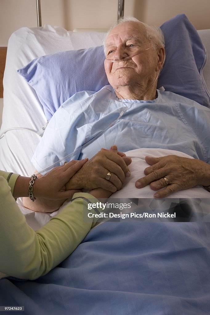 Man in a hospital bed