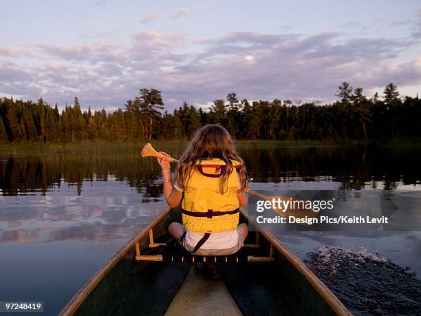 girl in canoe - lake of the woods foto e immagini stock