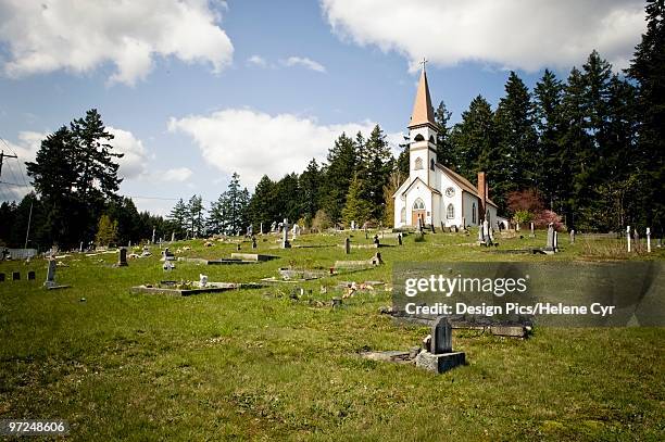 small church and cemetery - cowichan bay stock pictures, royalty-free photos & images