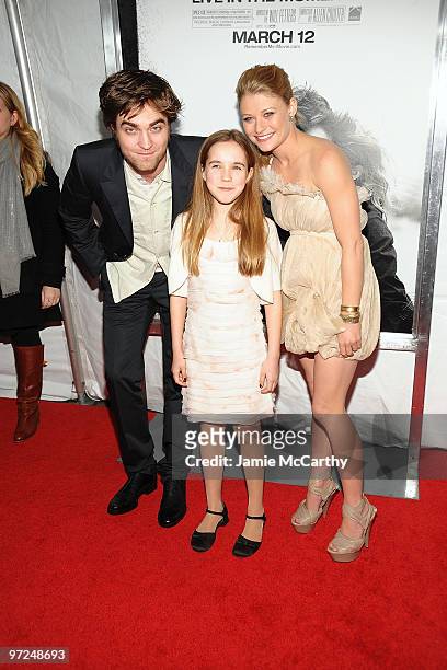 Actor Robert Pattinson, actress Ruby Jerins and actress Emilie de Ravin attend the premiere of "Remember Me" at the Paris Theatre on March 1, 2010 in...