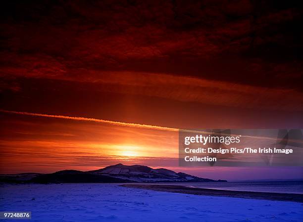 sunset over inch island, lough swilly, lisfannon, co donegal, ireland - county donegal stock pictures, royalty-free photos & images