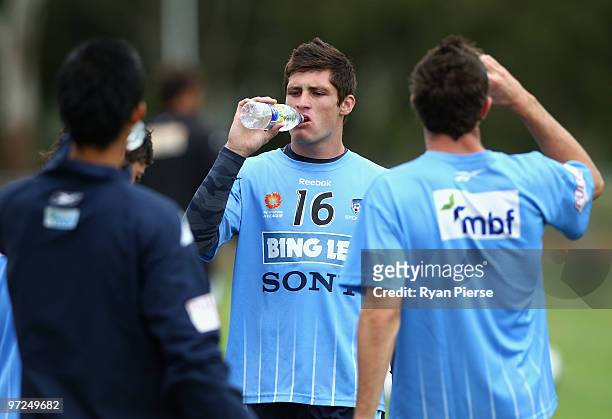 Chris Payne of Sydney FC takes a break during a Sydney FC A-League training session at Macquarie Field on March 2, 2010 in Sydney, Australia.
