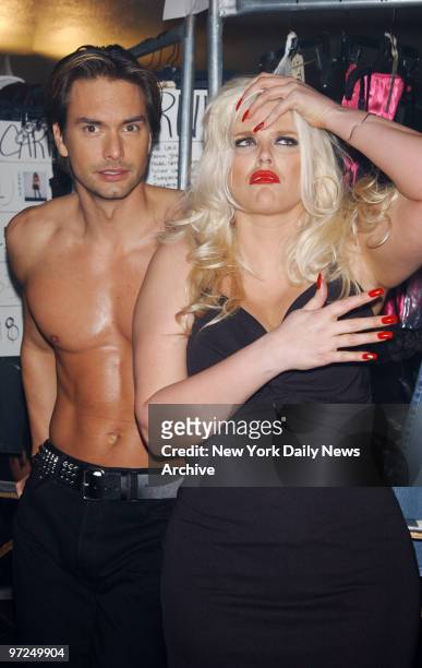 Anna Nicole Smith with model Marcus Schenkenberg backstage at the Lane Bryant Fashion Show held at Roseland.