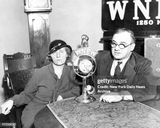 Anna Hauptmann with Jack Lait making an appeal for her husband Bruno Hauptmann over WNEW radio. He was accused of kidnapping and killing Charles...