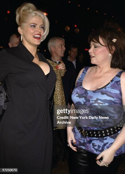 Anna Nicole Smith and Roseanne attending the Lane Bryant fashion show at Studio 54.