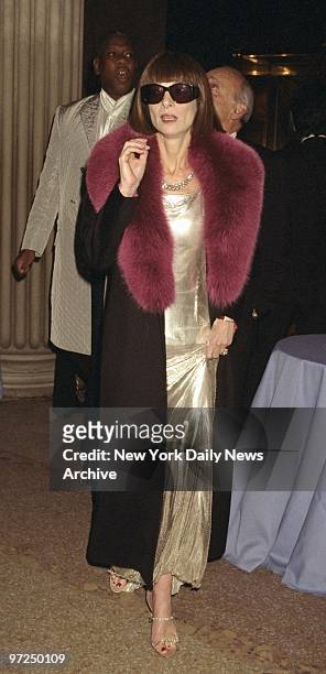 Anna Wintour arrives with sunglasses attending Metropolitan Museum of Art Costume Institute gala to introduce Gianni Versace Exhibition.