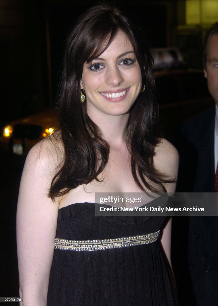 Anne Hathaway arrives at the St. Regis Hotel for an auction