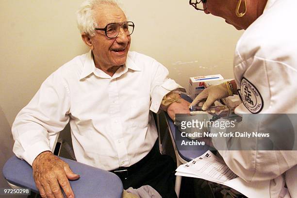 Anthony Camarda smiles as he gets his free PSA blood test at Long Island College Hospital in Brooklyn. Armed with Daily News coupons, men from all...