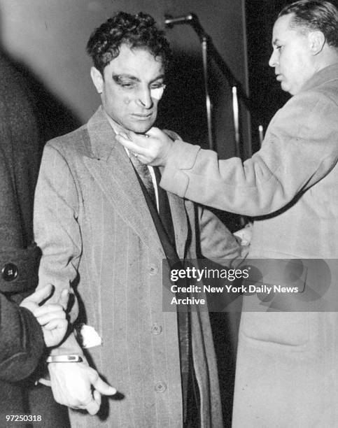 Anthony Esposito, brother of a famous mobster, is shown in a lineup.