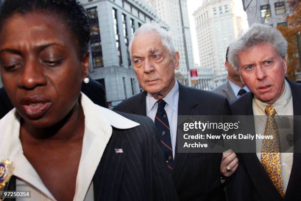 Anthony Marshall son of the late philanthropist and socialite Brooke Astor, is escorted by officers as he enters Manhattan Supreme Court. Marshall...