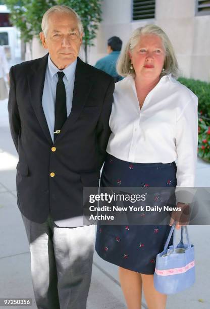 Anthony Marshall and wife Charlene leave their E. 79th St. Apartment building this morning, the day after his mother, famed philanthropist Brooke...