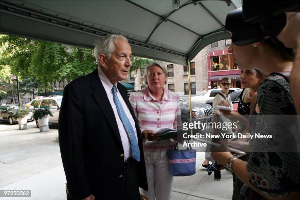 Anthony Marshall, son of New York philanthropist Brooke Astor, speaks to the media while wife Charlene looks on as they arrive at their apartment...