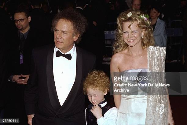 Art Garfunkel arrives with wife Kim and son James for the Grammy Awards at Radio City Music Hall.,