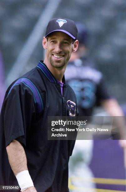 Arizona Diamondbacks' outfielder Luis Gonzalez smiles during practice at Bank One Ballpark in Phoenix, Ariz., on the day before his team takes on the...