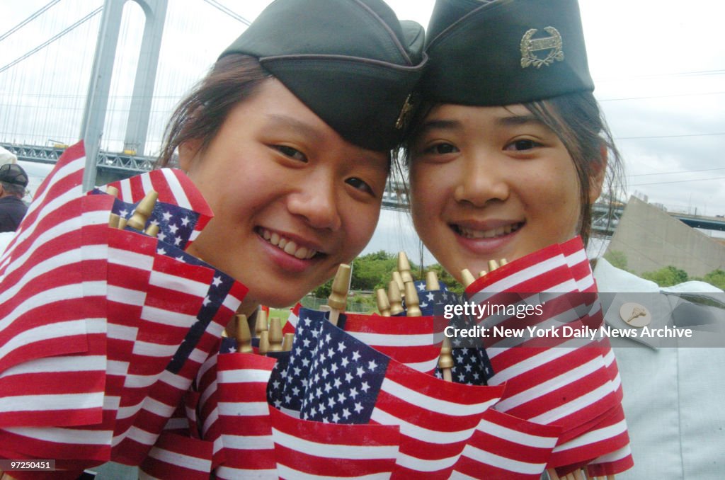 Army R.O.T.C. cadets Lisa Choe (left) and Sharon Li show the