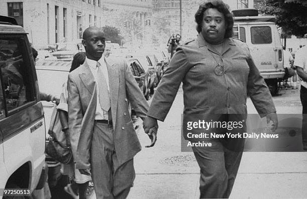 Antron McCray , accused in the case of the rape and beating of a Central Park jogger, walks to the the Manhattan Supreme Court with civil rights...