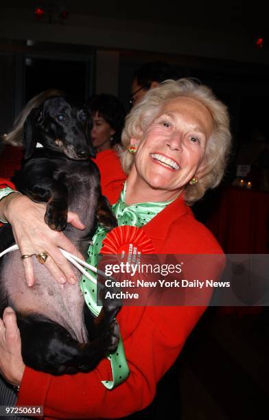 Archaeologist Iris Love shows off her dachshund, Champion Dachsmith Love Adamas Tyche, who will be competing in the Westminster Kennel Club Dog Show...