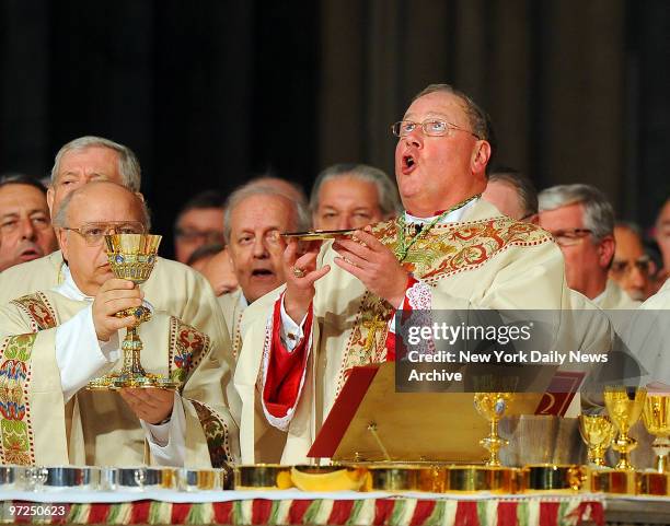 Archbishop conducts the communion during the ceremonial Mass where Archbishop Timothy Dolan was installed as spiritual leader of 2.5 million New York...