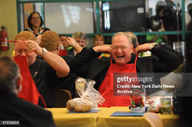 Archbishop Timothy M. Dolan visits the Catholic Charities Mobile Food Pantry at Highbridge, West Bronx Community Center at 1527 Jesup Avenue in the...